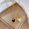 Black and White Heart Pendant Necklace in Gold