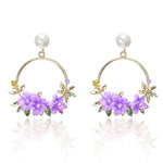 Flower and Pearl Earrings in Gold