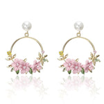 Flower and Pearl Earrings in Gold