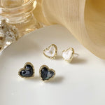 Heart earrings with crystal in gold