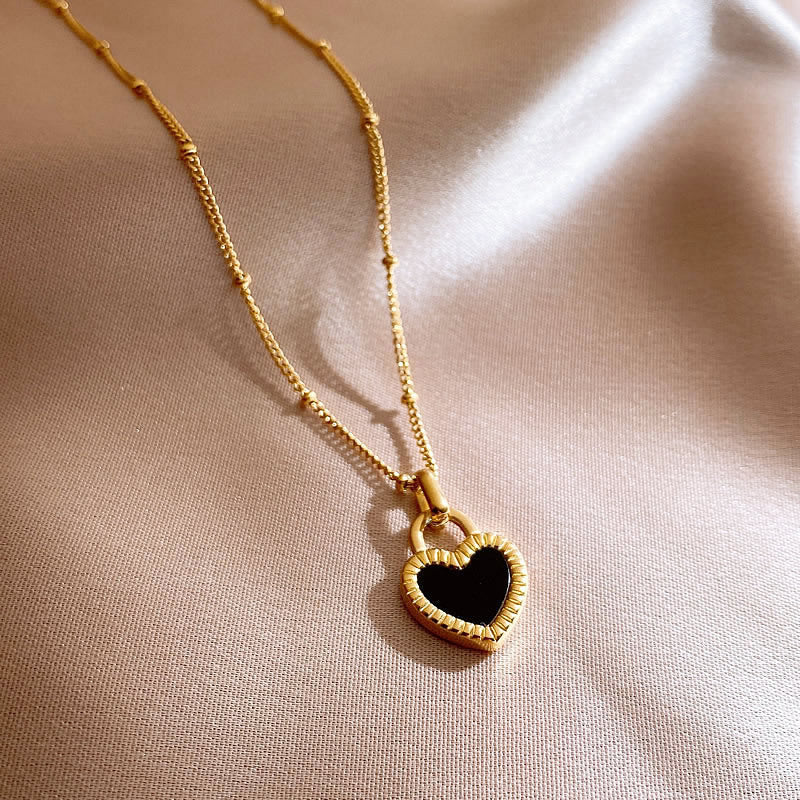 Black and White Heart Pendant Necklace in Gold