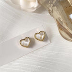 Heart earrings with crystal in gold